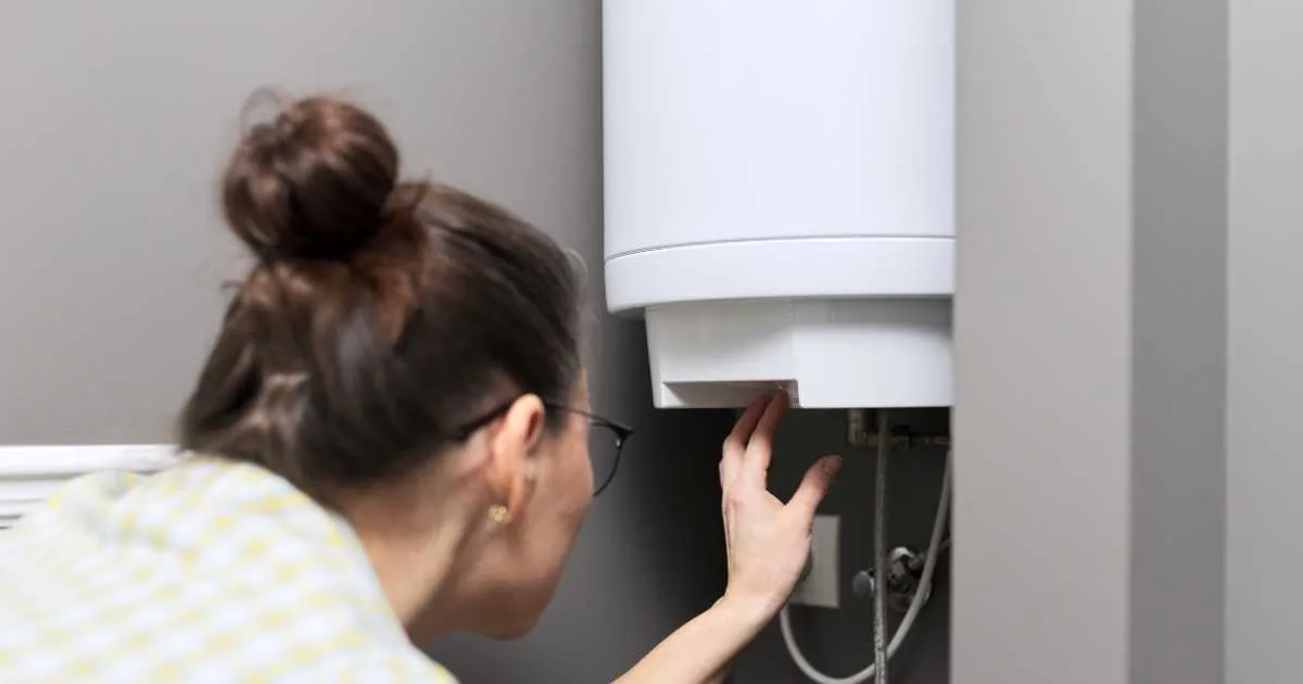 homeowner checking the electric heater