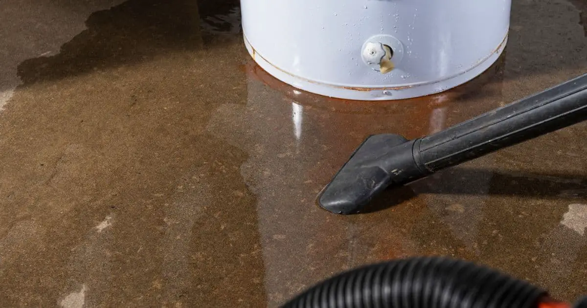 Vacuuming up water from a leaking residential domestic water heater